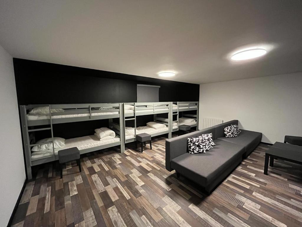 LES MAISONS SOLAIRES 4 Gîtes pour 8 à 16 pers Contact O6614O9II9 Griesheim-près-Molsheim Chambre photo